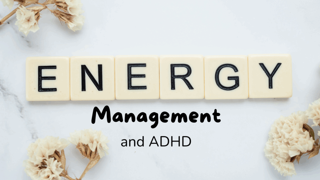 Scrabble tiles spell ENERGY on a white surface with the text ‘Management and ADHD’; dried flowers frame the corners.