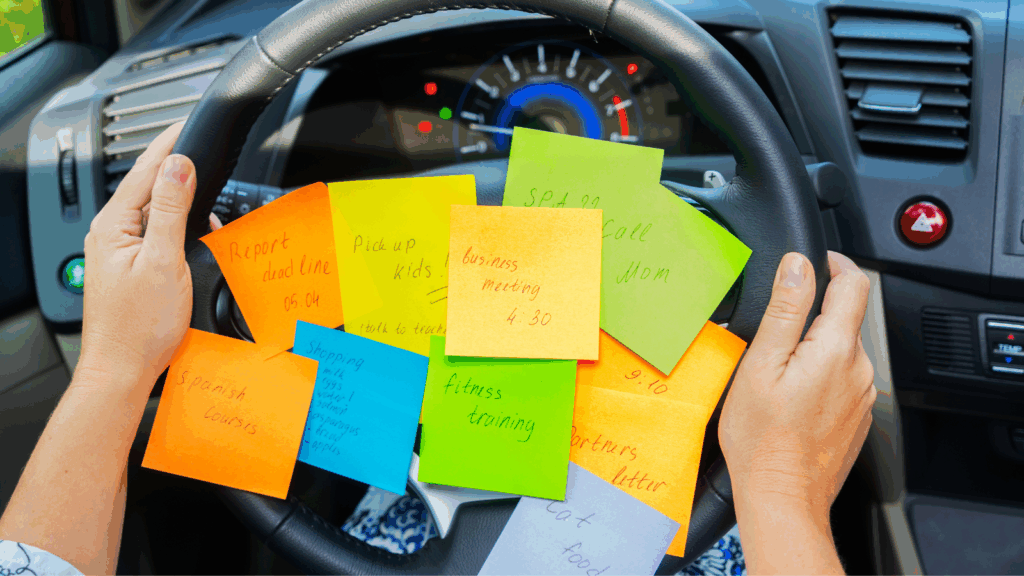 Current image: Colorful sticky notes with endless tasks on a car steering wheel, representing ADHD overwhelm and morning chaos.